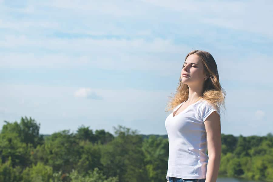 Save Download Preview Woman with closed eyes in sunlight sunlight closed eyes